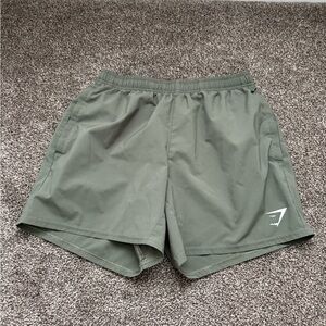 green gymshark shorts